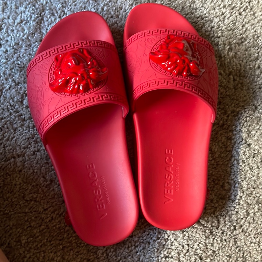 Versace red slides( BRAND NEW NEVER WORN)
